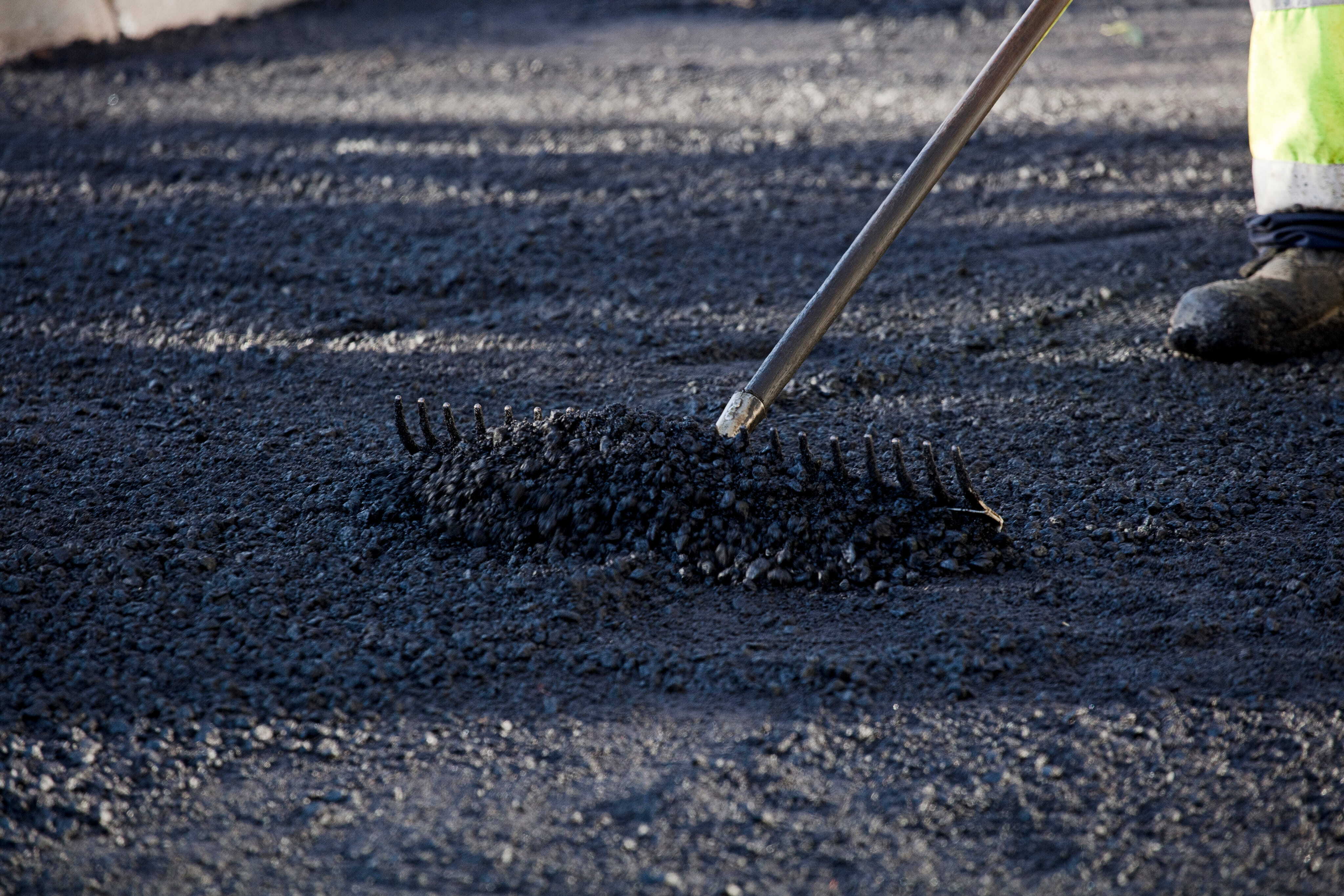 how long to stay off new asphalt driveway
